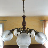 Glass and wood chandelier and brass