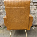 Pair of mustard skaï armchairs, brass feet