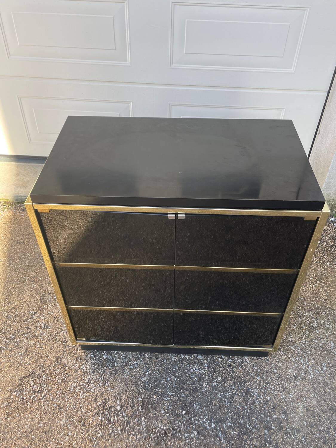 Vintage black and gold TV cabinet from the 70s/80s