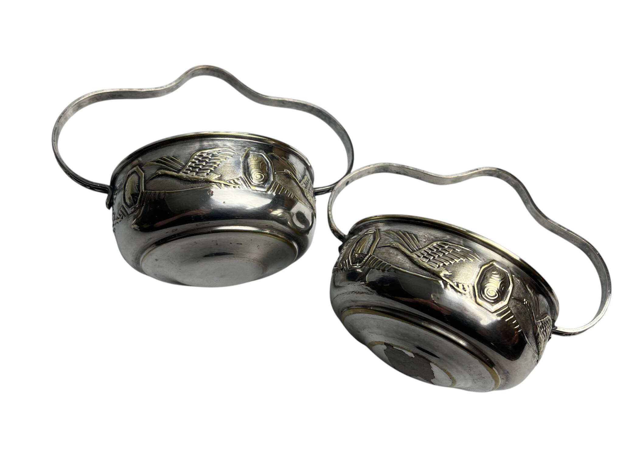 Art Deco pair of basket-shaped bowls with handles, silver-plated, circa 1940.