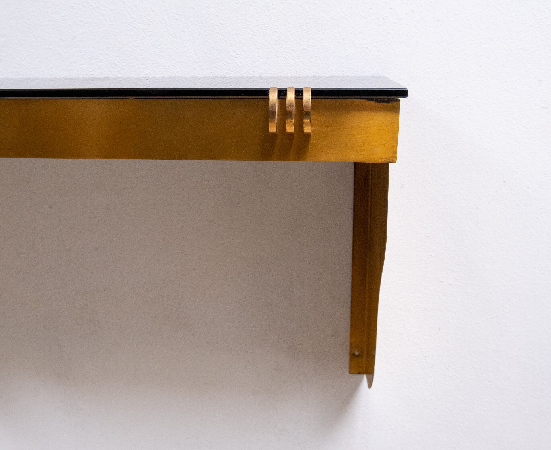 Art deco brass wall console Jean Pascaud