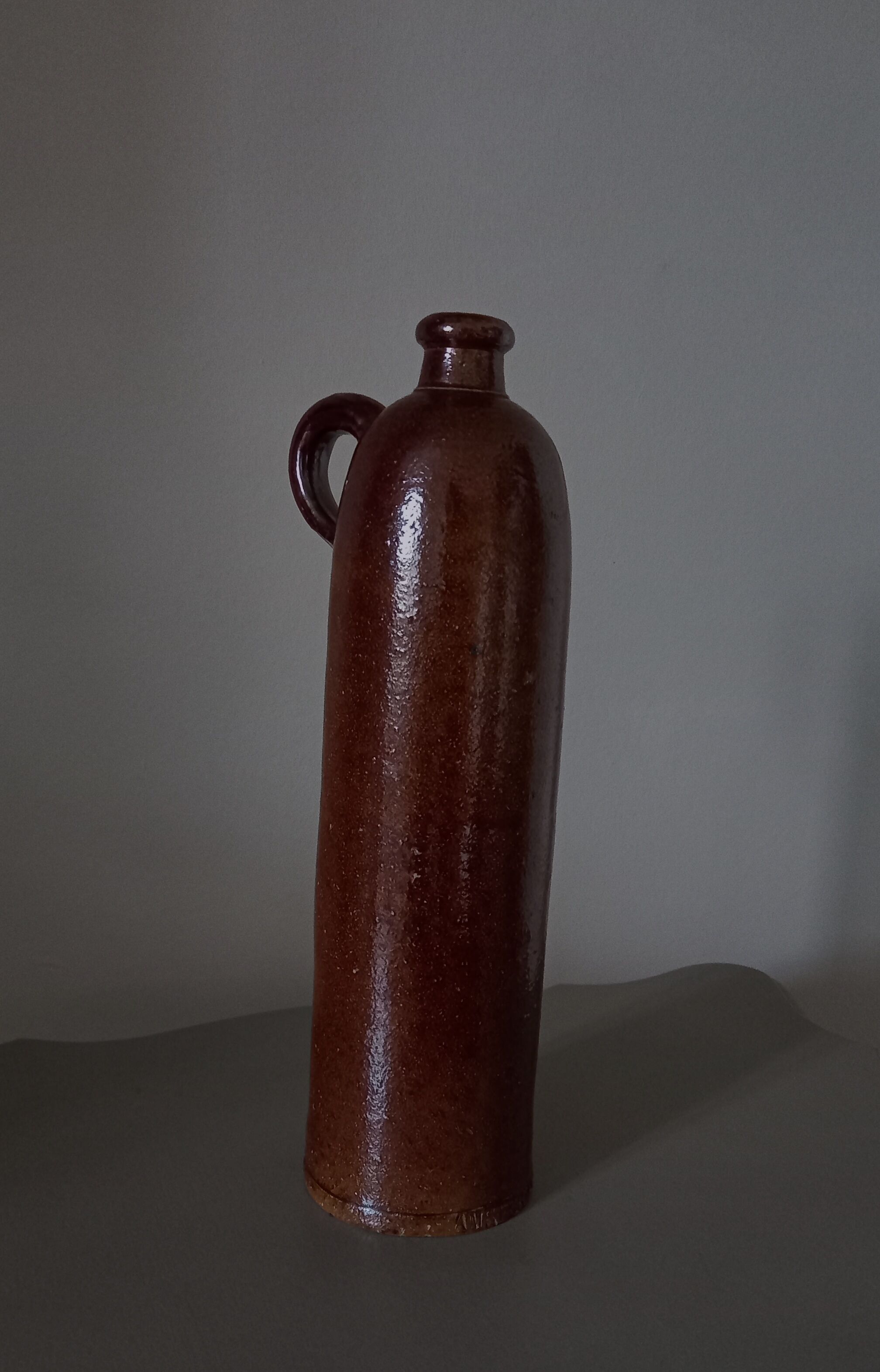 Brown glazed stoneware bottle Amsterdamsche, nineteenth century