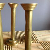 Series of 4 brass candlesticks