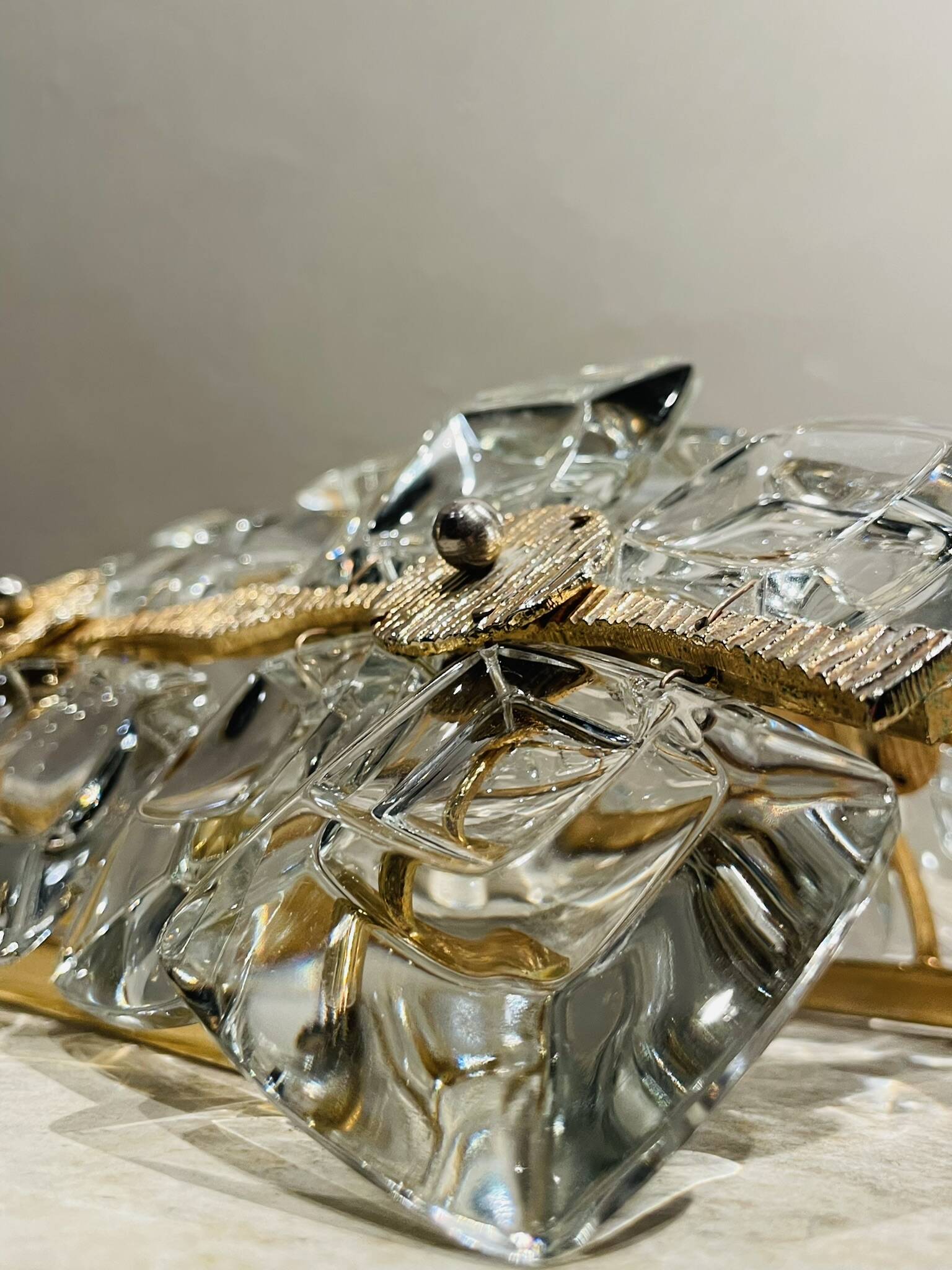 Pair of crystal wall lights in the Sciolari style.
