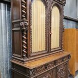 Two-body buffet in solid oak, richly carved in the Renaissance style.