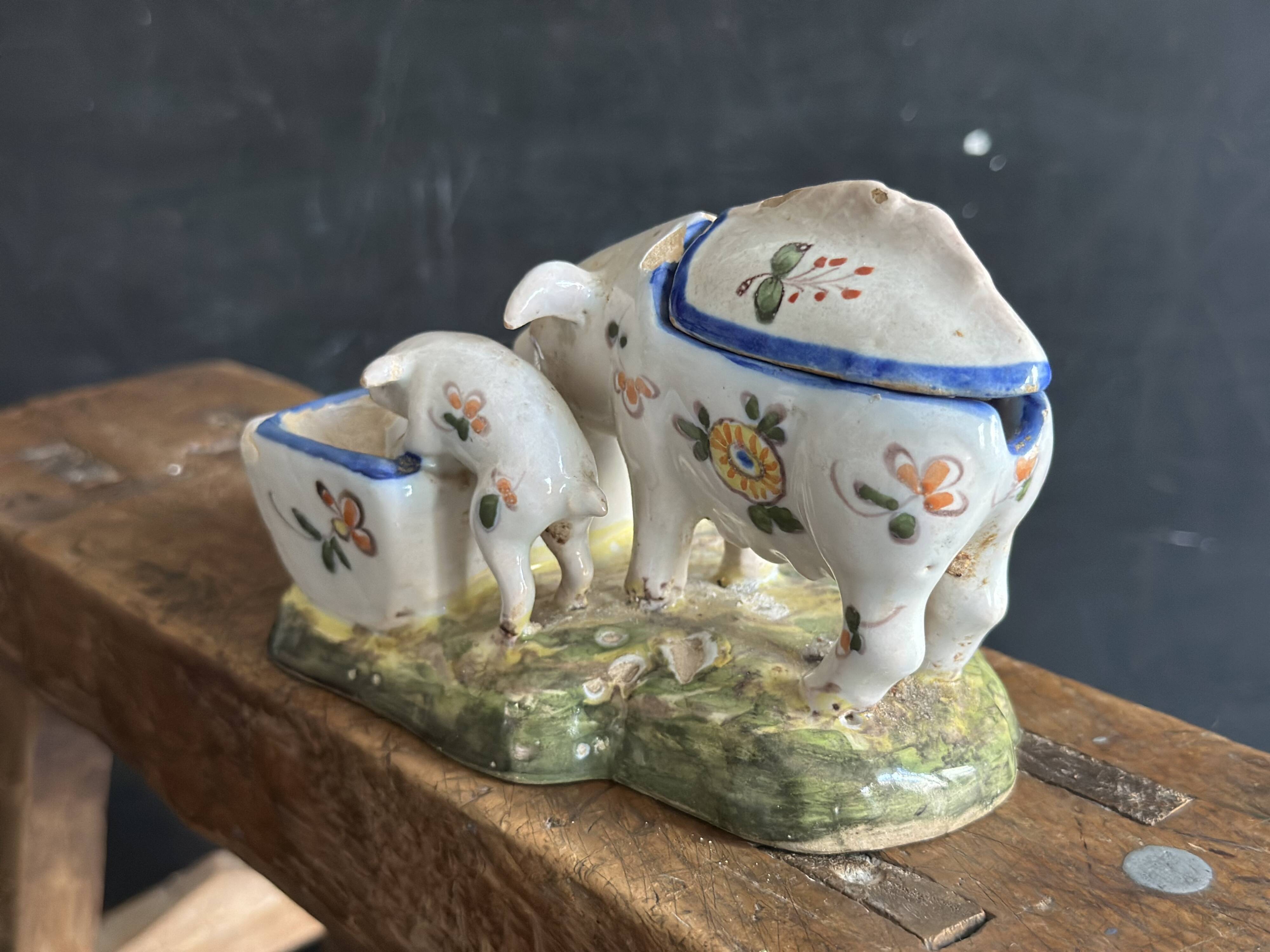 Antique earthenware pig box, salt cellar or mustard pot, floral decoration.