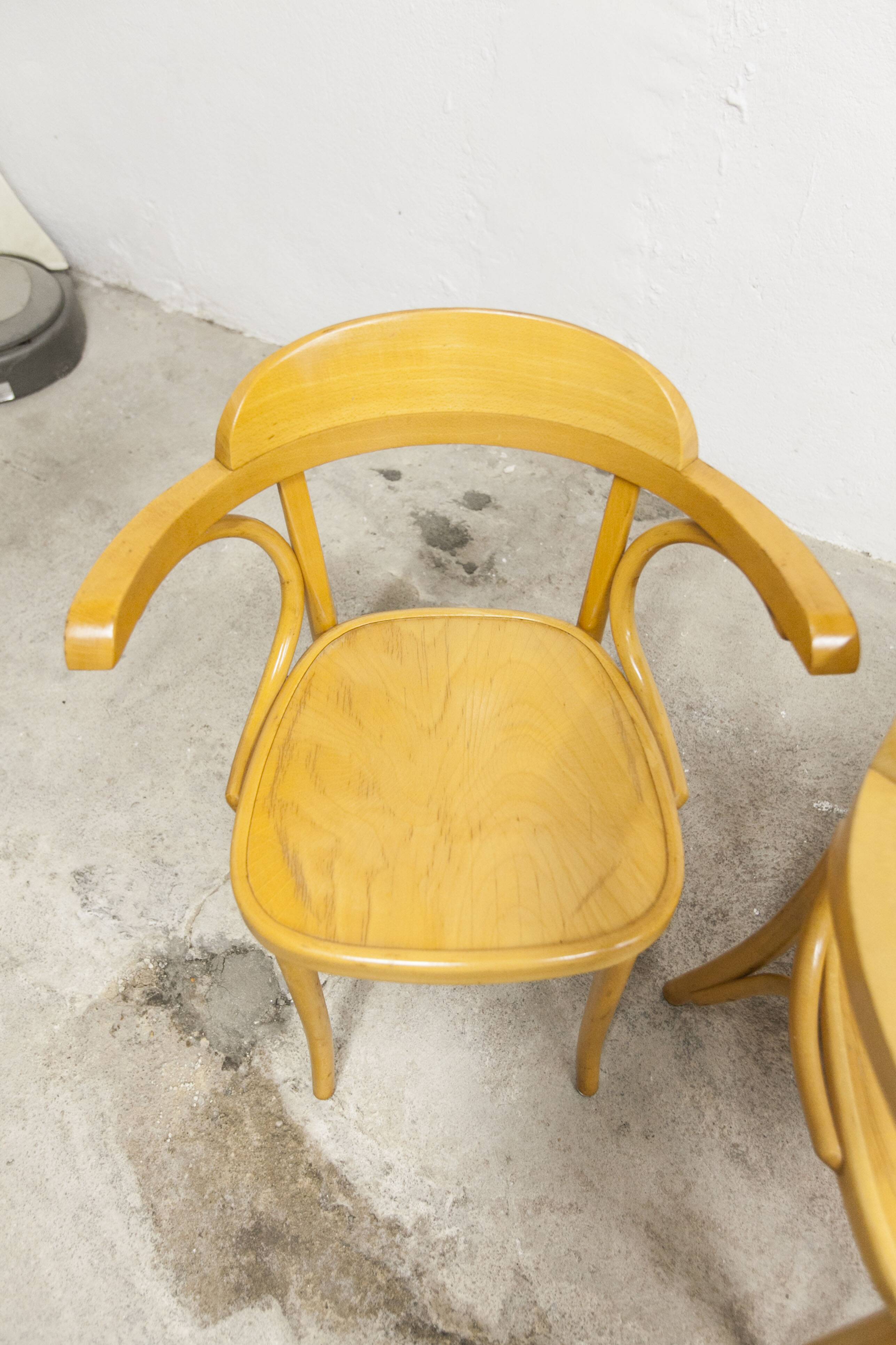 Set of 4 bistro armchairs with armrests from the 1960s.