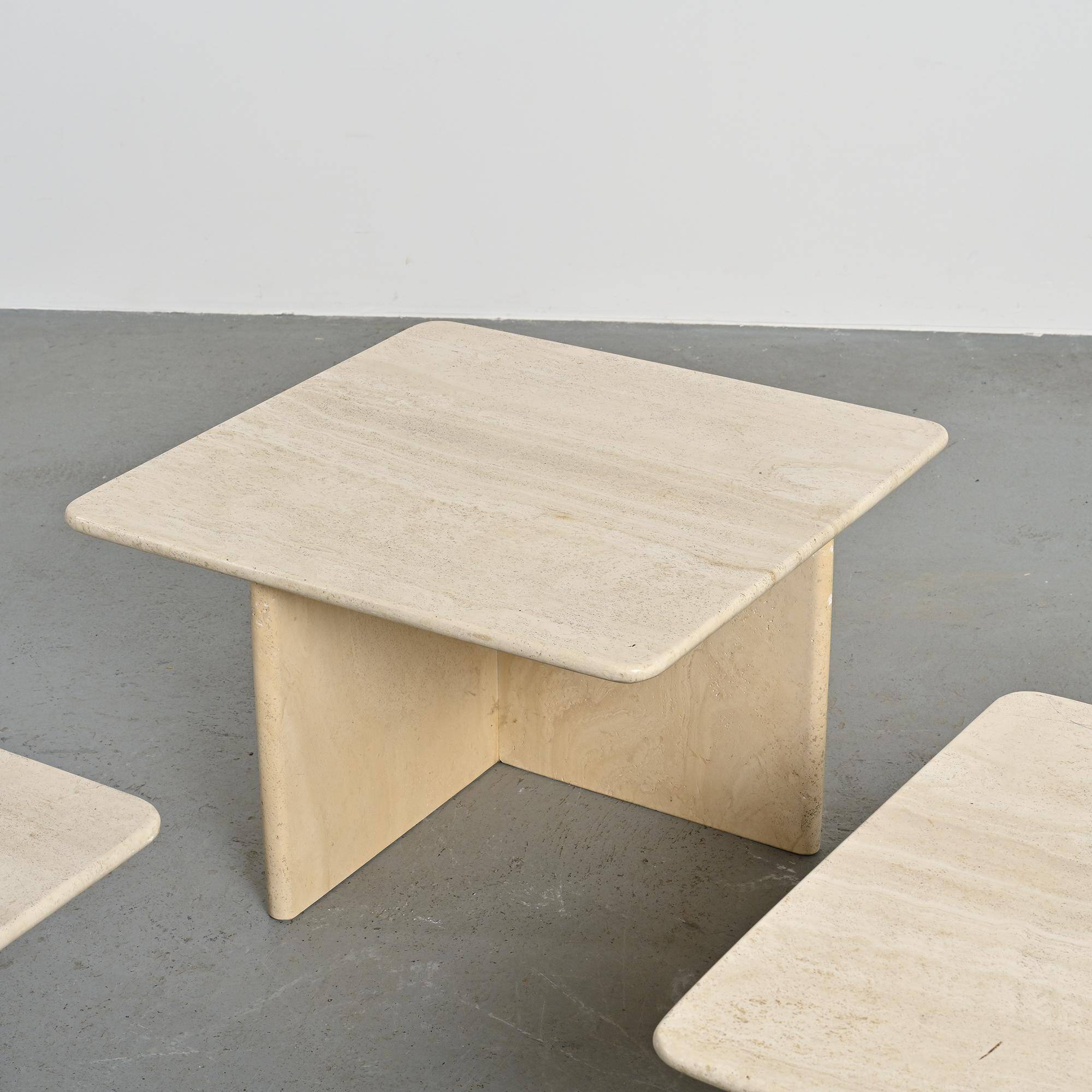 Set of three nesting tables in travertine, Italy circa 1970.