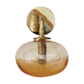 Vintage globe wall lamp in amber glass