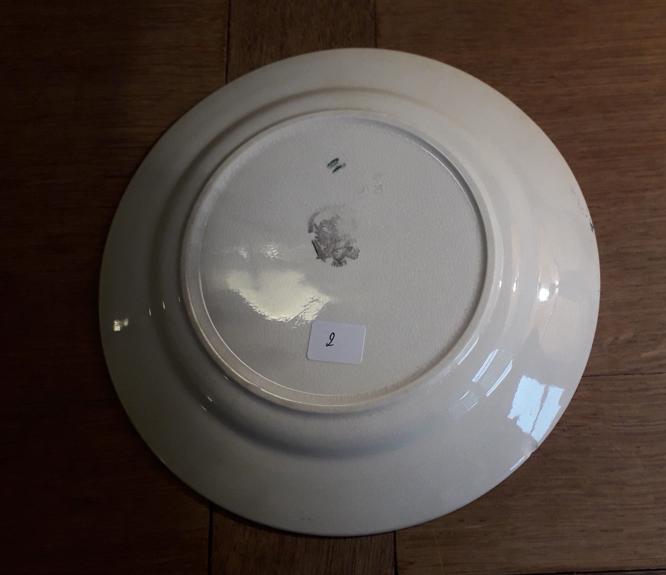 Flat plate in nimy earthenware bird decorations