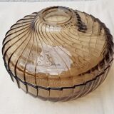 Empty amber glass pocket with lid