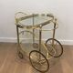 Oval Brass Rolling Table from Maison Baguès