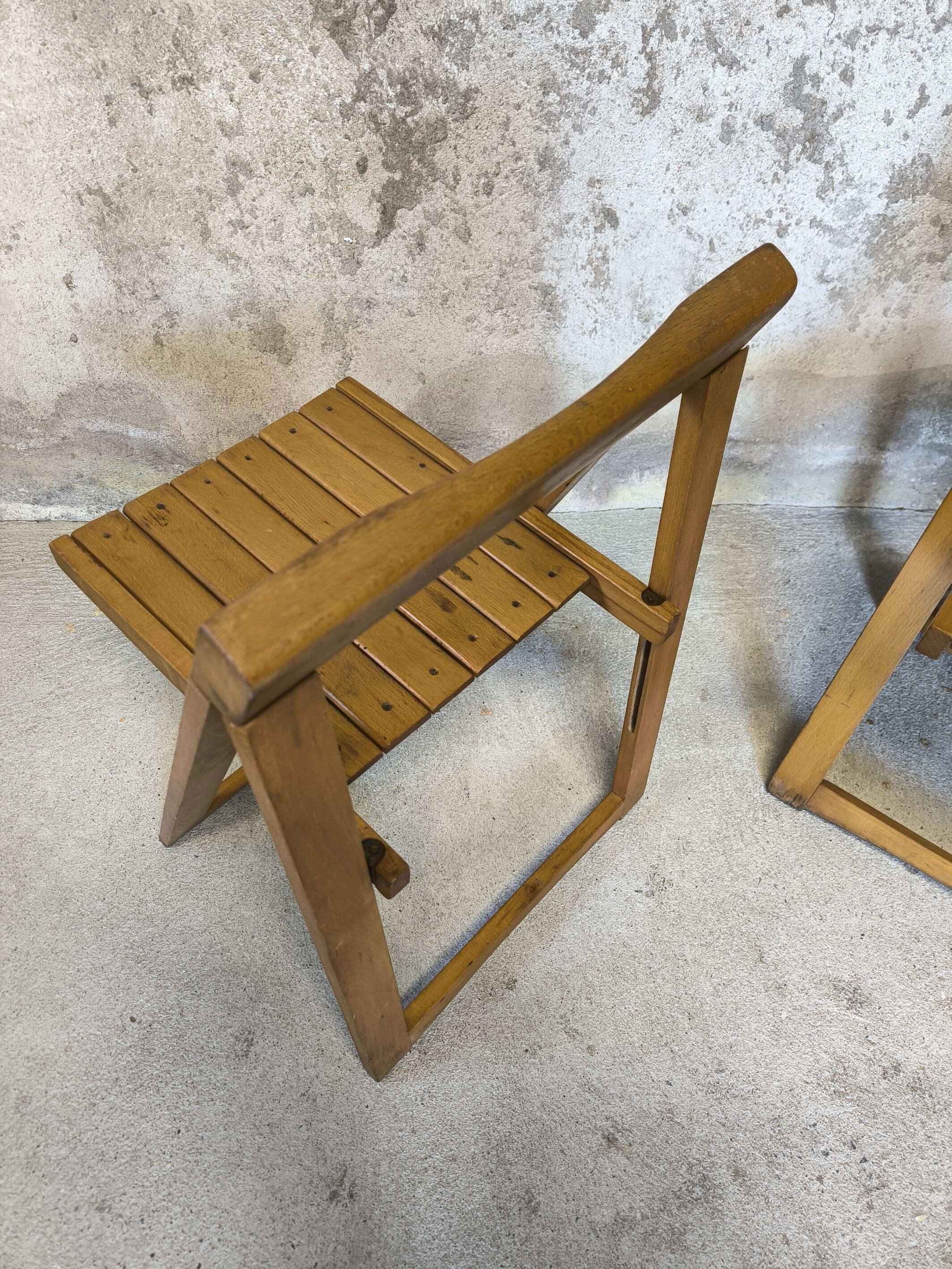 Pair of vintage folding wooden chairs by Aldo Jacober