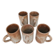 Set of 5 vintage handcrafted stoneware mugs in beige, pink, and white glazed stoneware