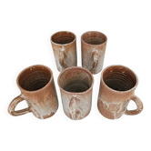 Set of 5 vintage handcrafted stoneware mugs in beige, pink, and white glazed stoneware