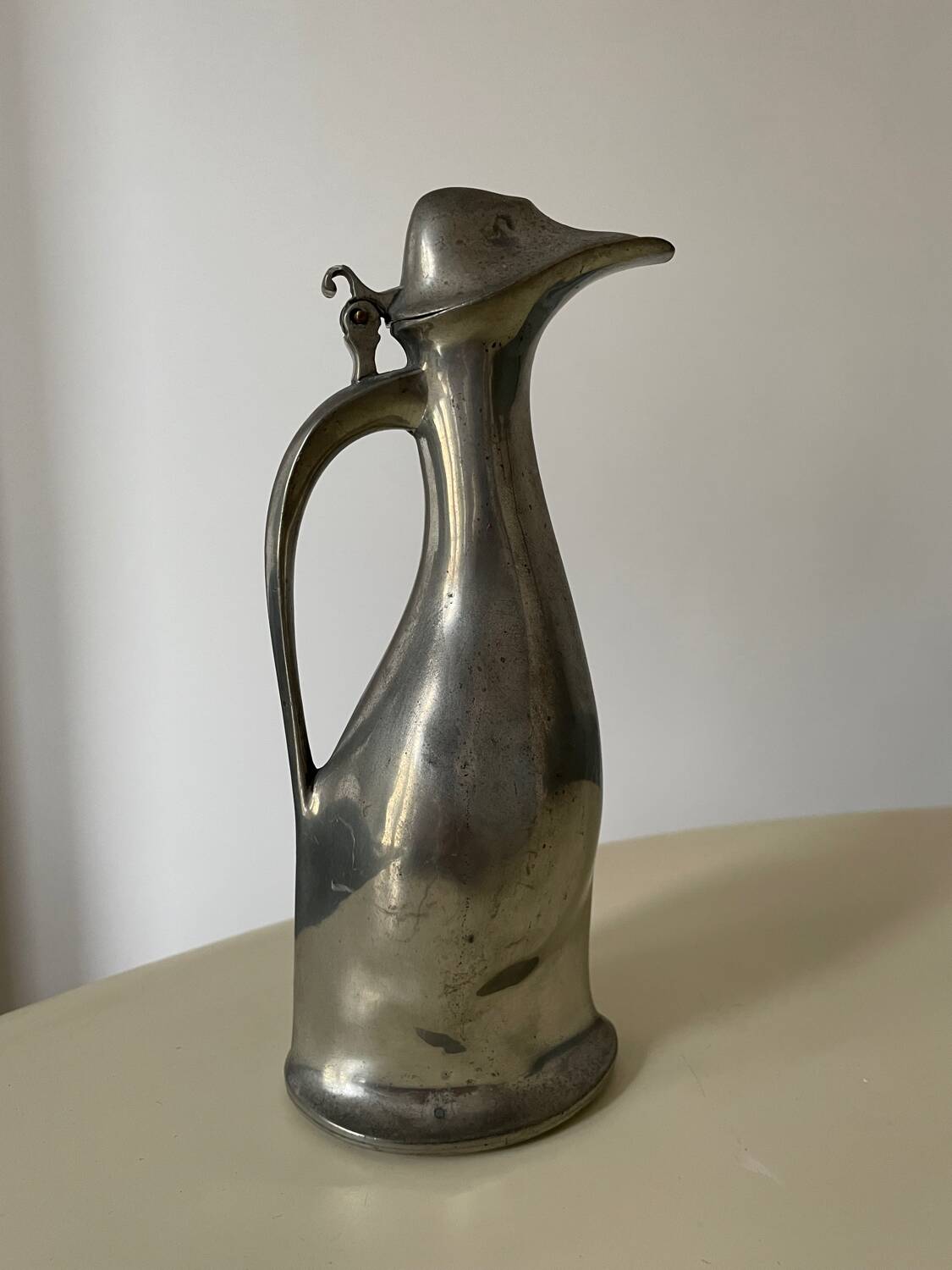 Polished pewter penguin-shaped carafe designed by Hugo Leven for Kayserzinn
