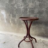Pedestal table in curved wood