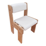 Brutalist chair in wood and boucle