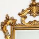Large Italian mirror in carved wood, traditional gilding, 1980s.