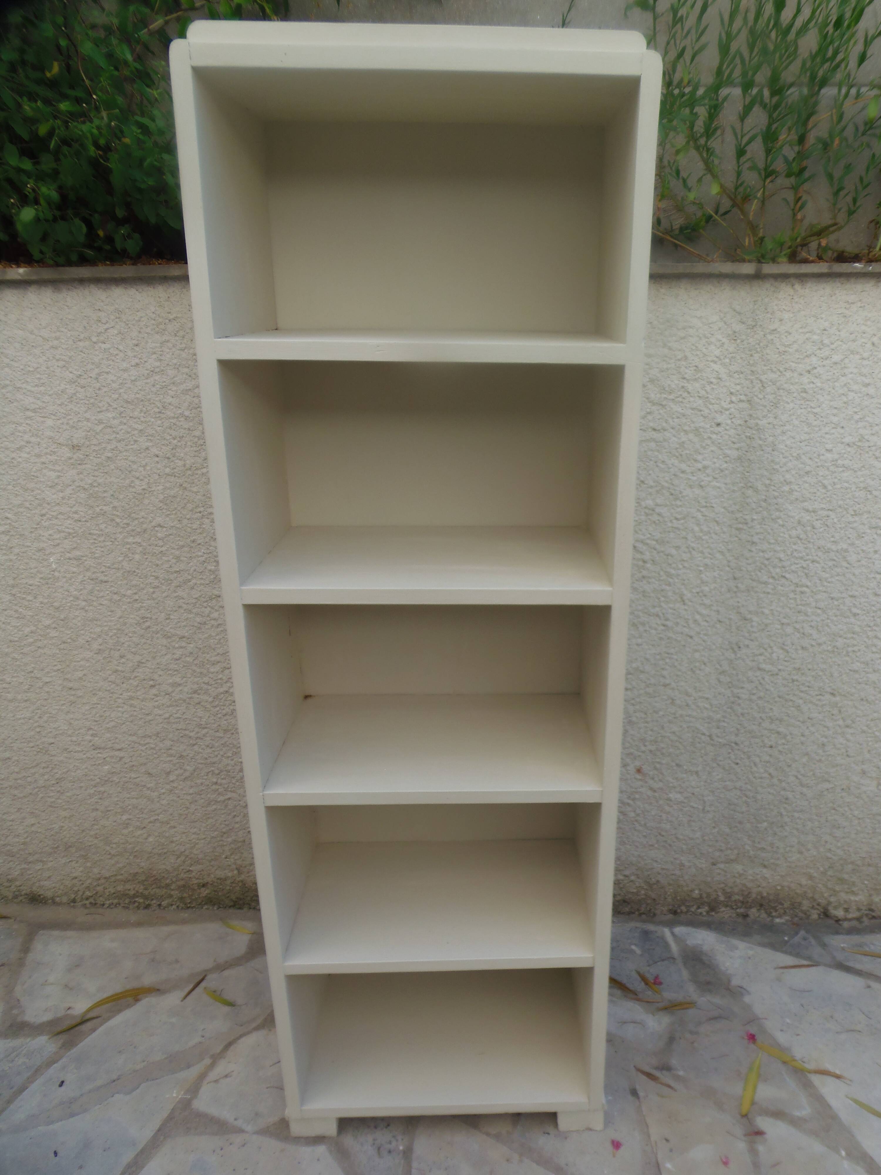 Renovated vintage 1950s library in beige.