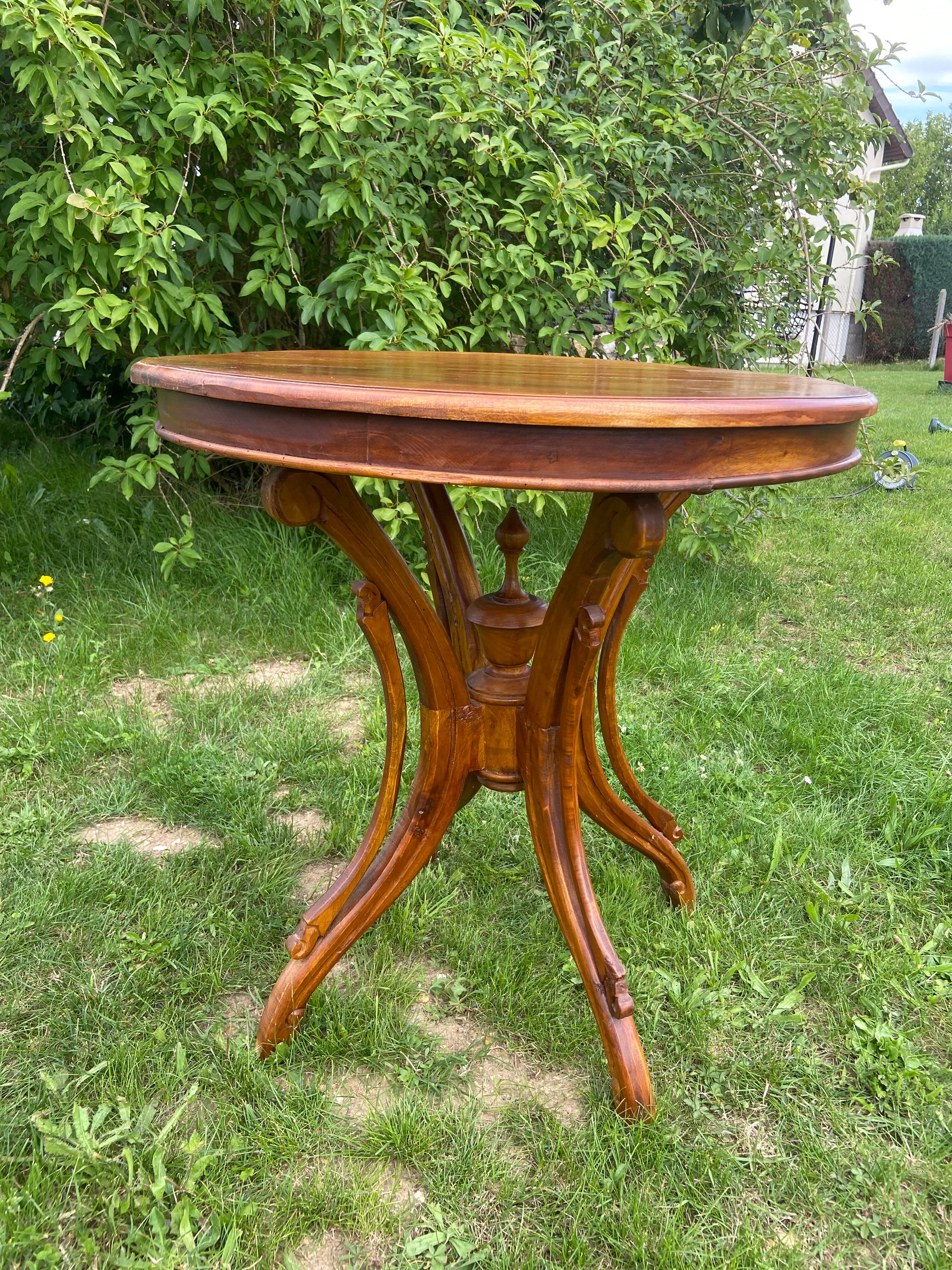 Round table and wrought iron chair