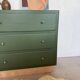 Vintage olive green chest of drawers with striped base