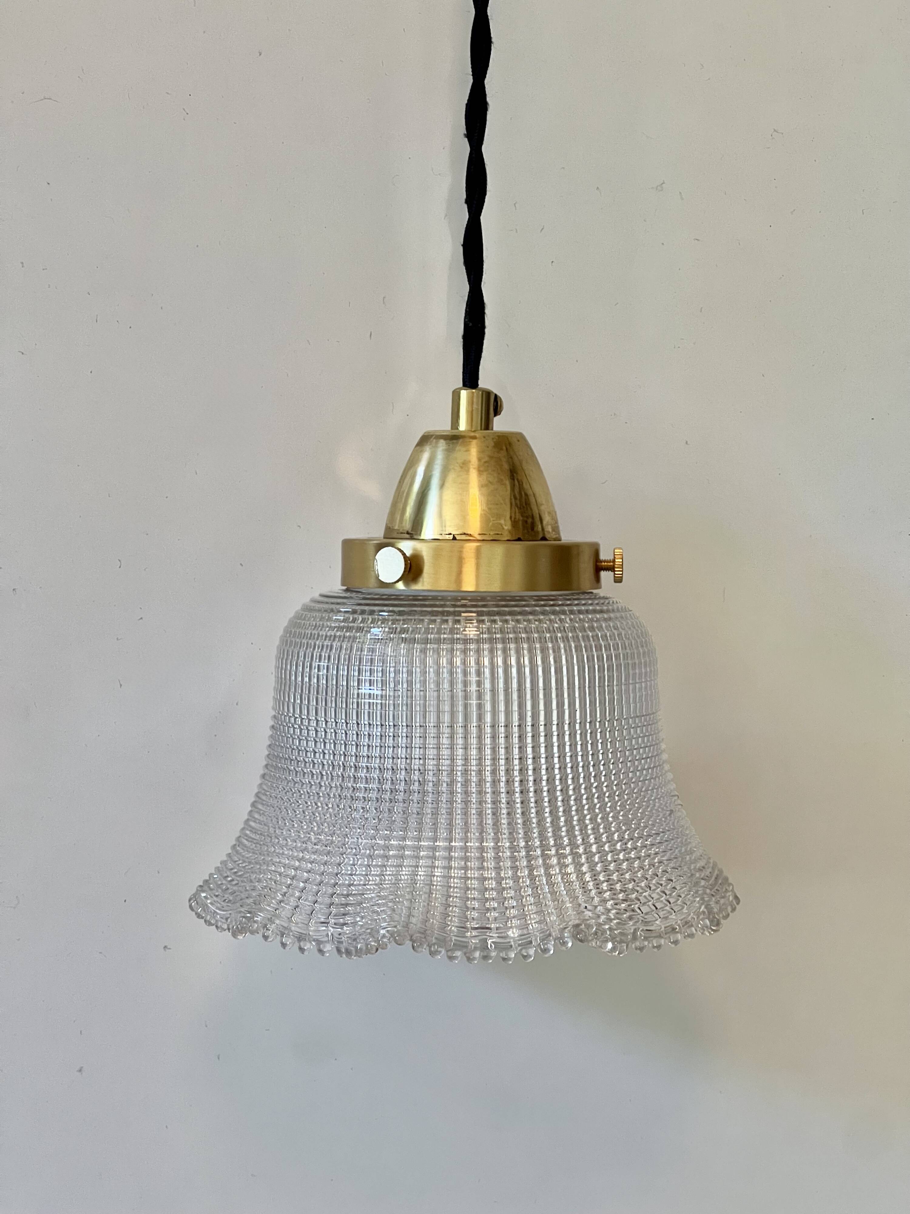 Industrial Holophane glass portable lamp with brass hook