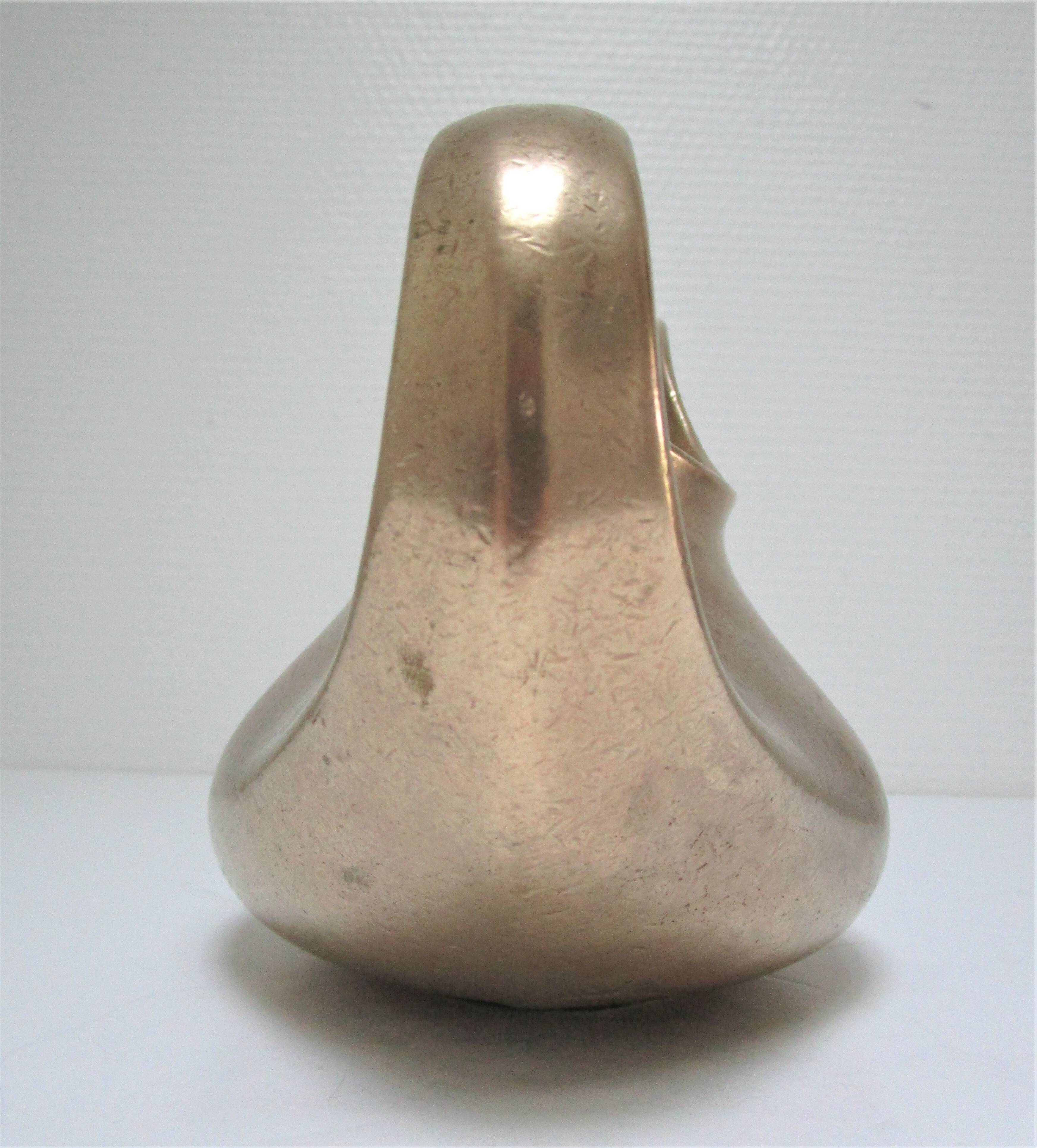 Stylized sculptural solid brass vase with handle
