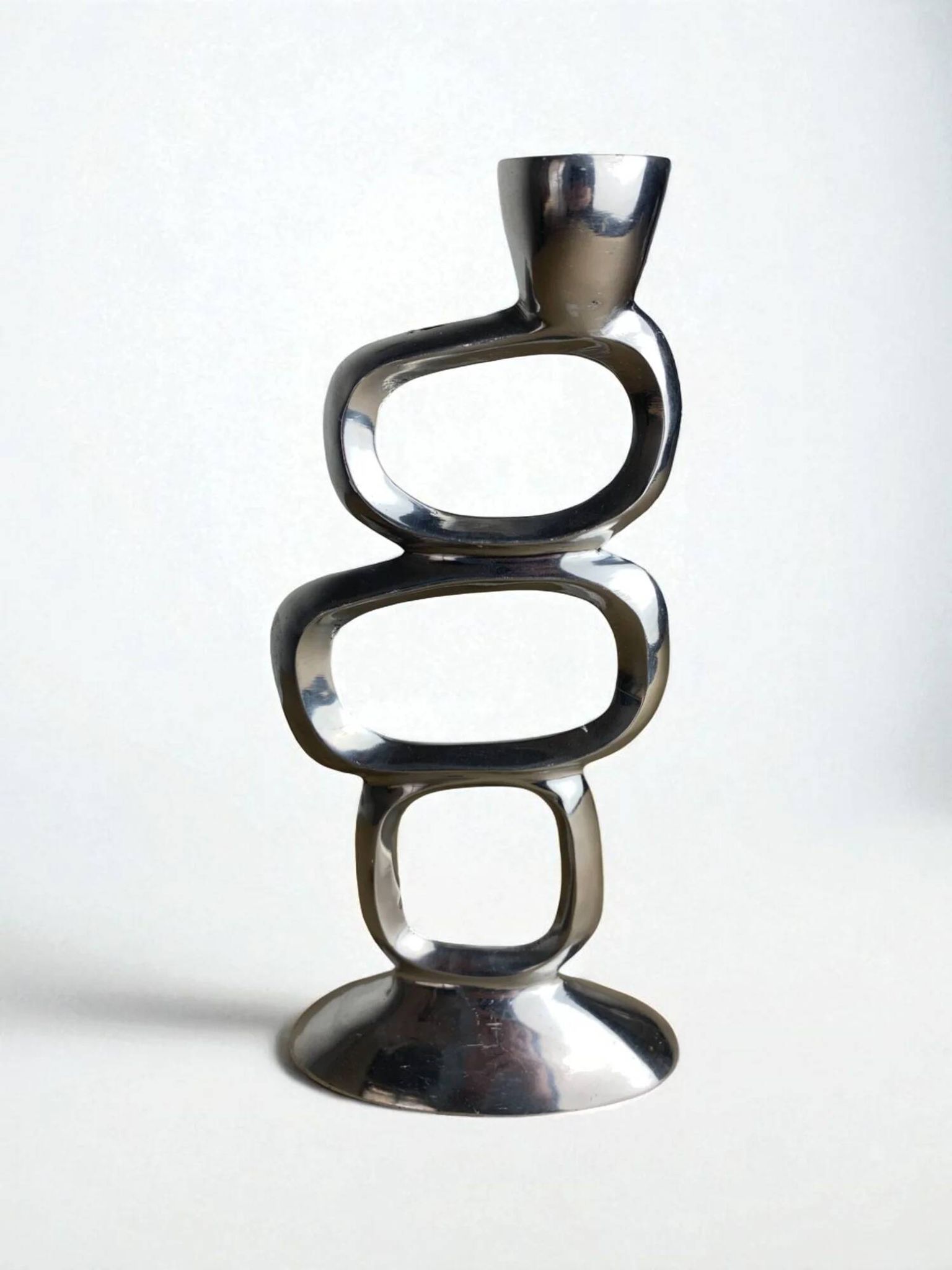 Circle candlestick by Matthew Hilton, aluminium, 1980s