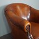 Leather club chair with black piping