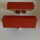 Pair of modernist swivel wall lights in red sheet metal, 1950s
