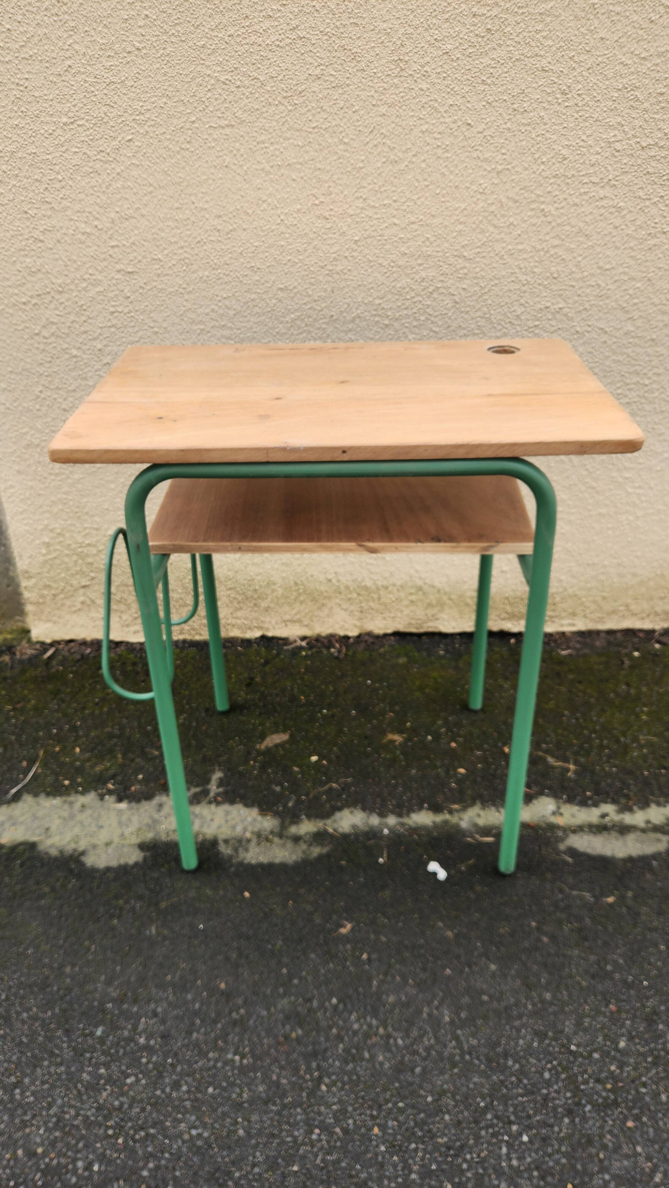Vintage green school desk from the 1960s-1970s.