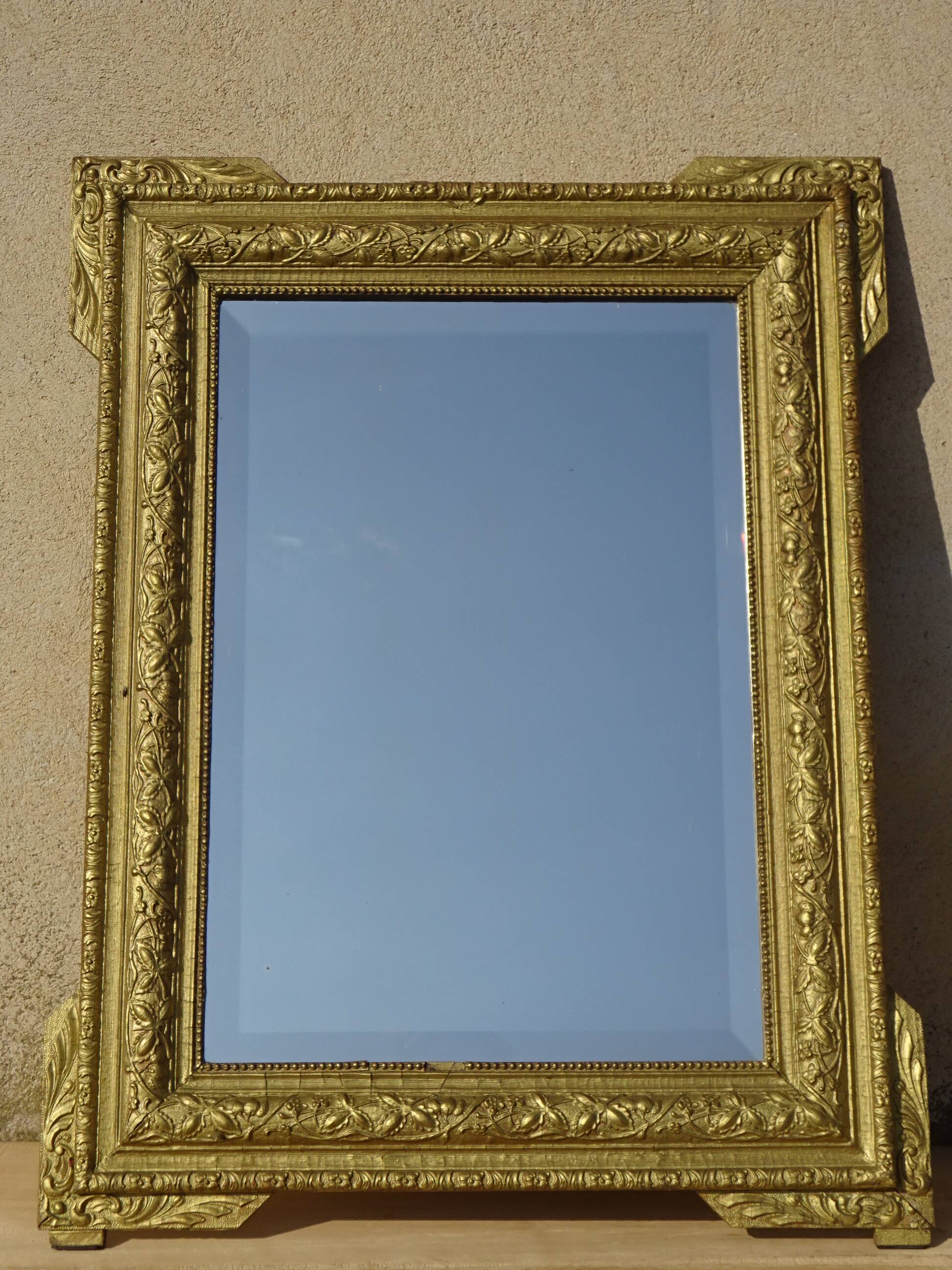 Antique wooden mirror with gilded stucco 65x83cm