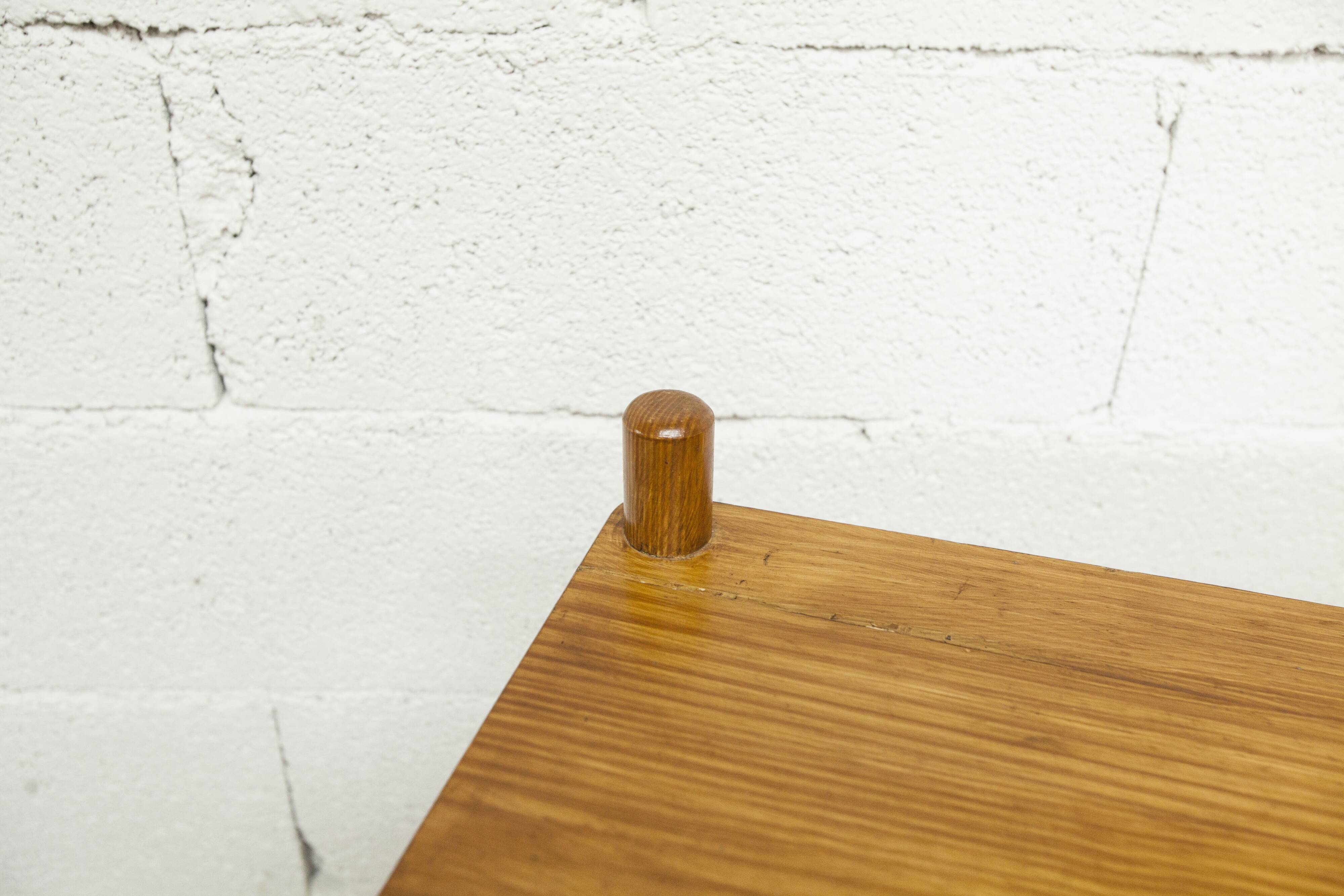 Scandinavian rectangular shelf from the 1960s, made of solid pine with round pencil legs.