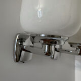 Chrome and opaline wall lights from the 70s.