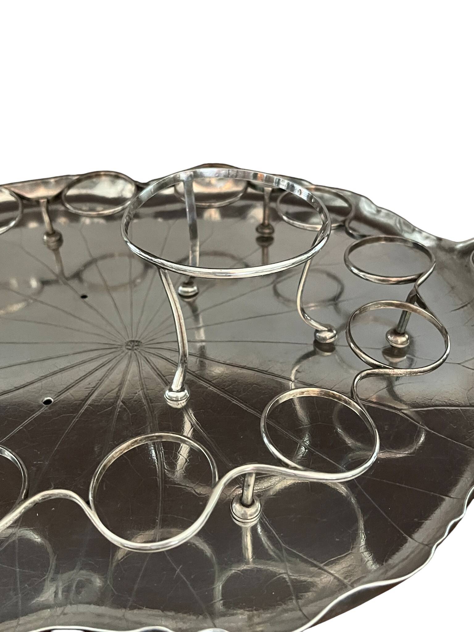 Silver-plated metal caviar service and 12 silver Minerva goblets, circa 1900