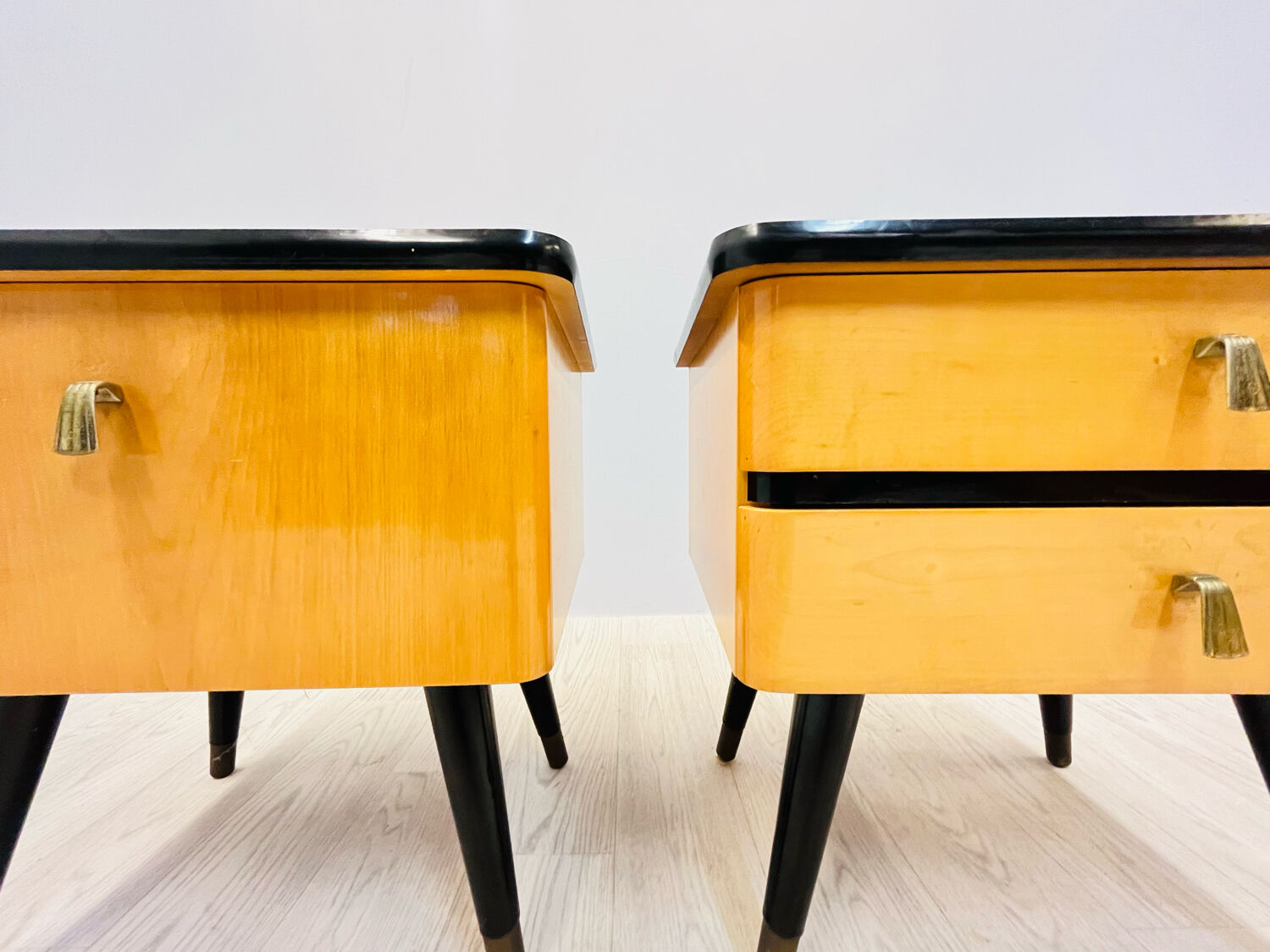 A pair of night cabinets