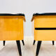 A pair of night cabinets