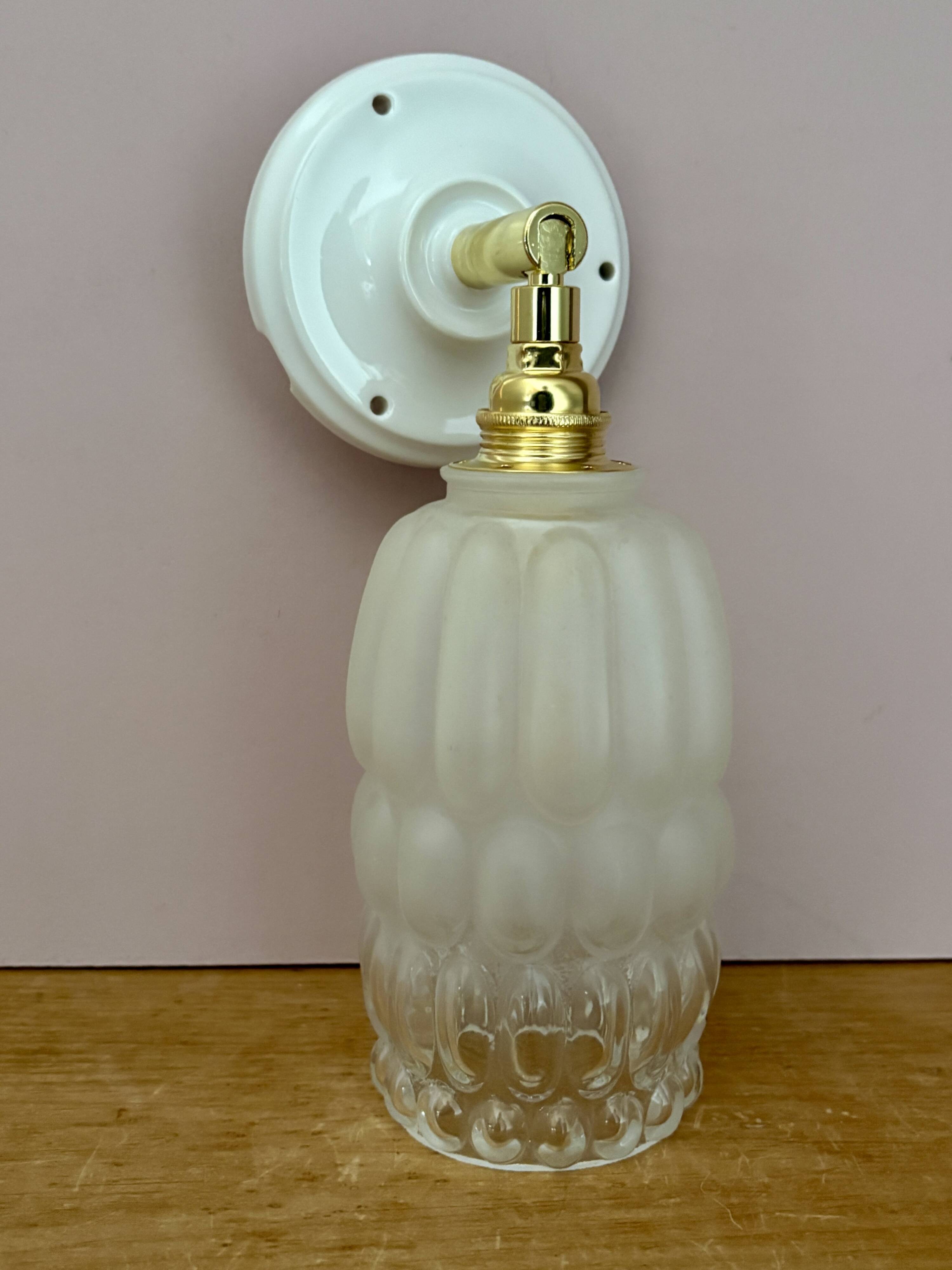 Vintage globe wall lamp in half frosted, half transparent glass