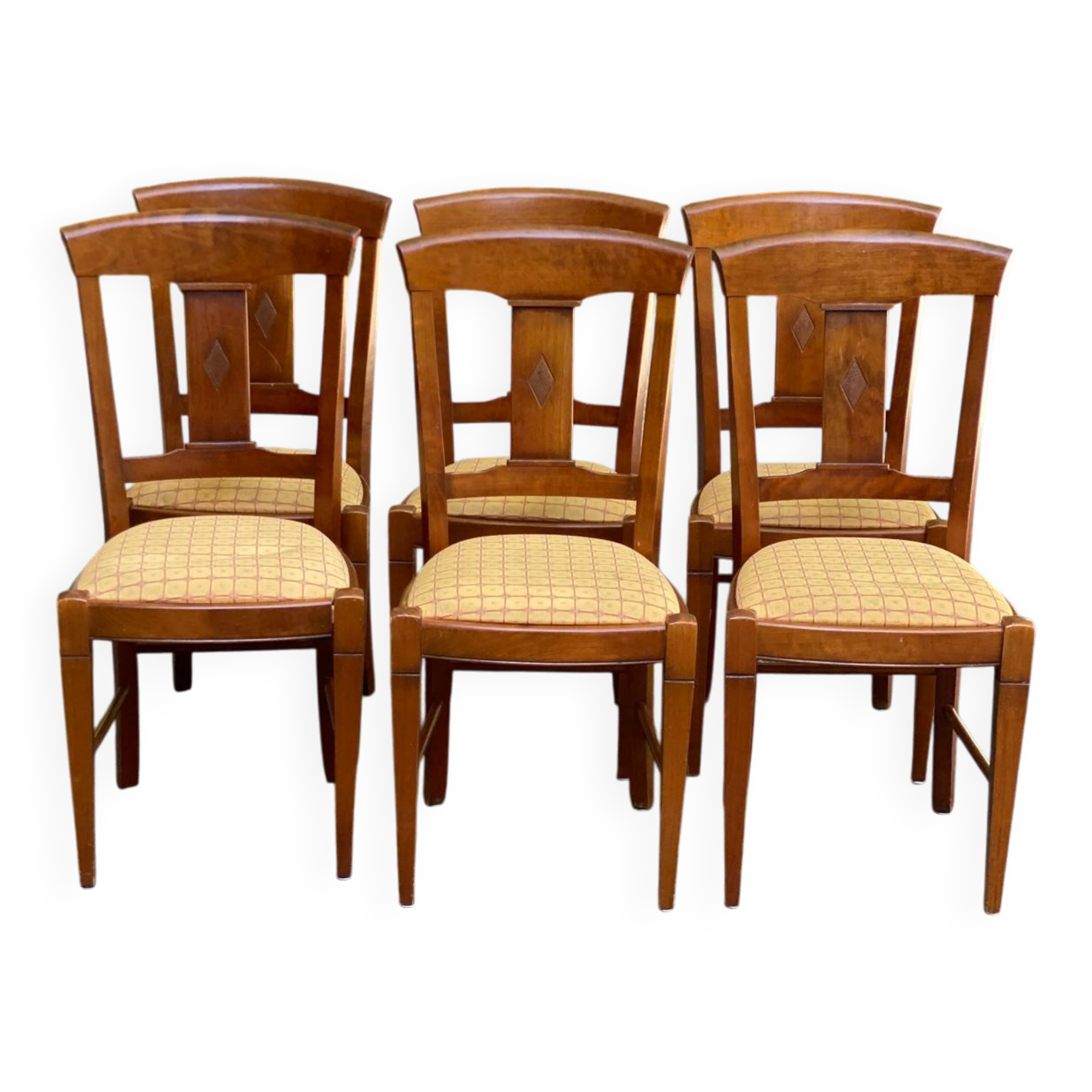 6 Syriel solid cherry wood dining chairs with yellow fabric.
