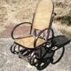 Vintage Thonet rocking chair in cane and bent wood.