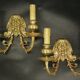 Pair of wall sconces with grotesque heads in 19th-century Renaissance style - bronze