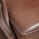 Comfortable cowhide wingback armchair in English style with a timeless look