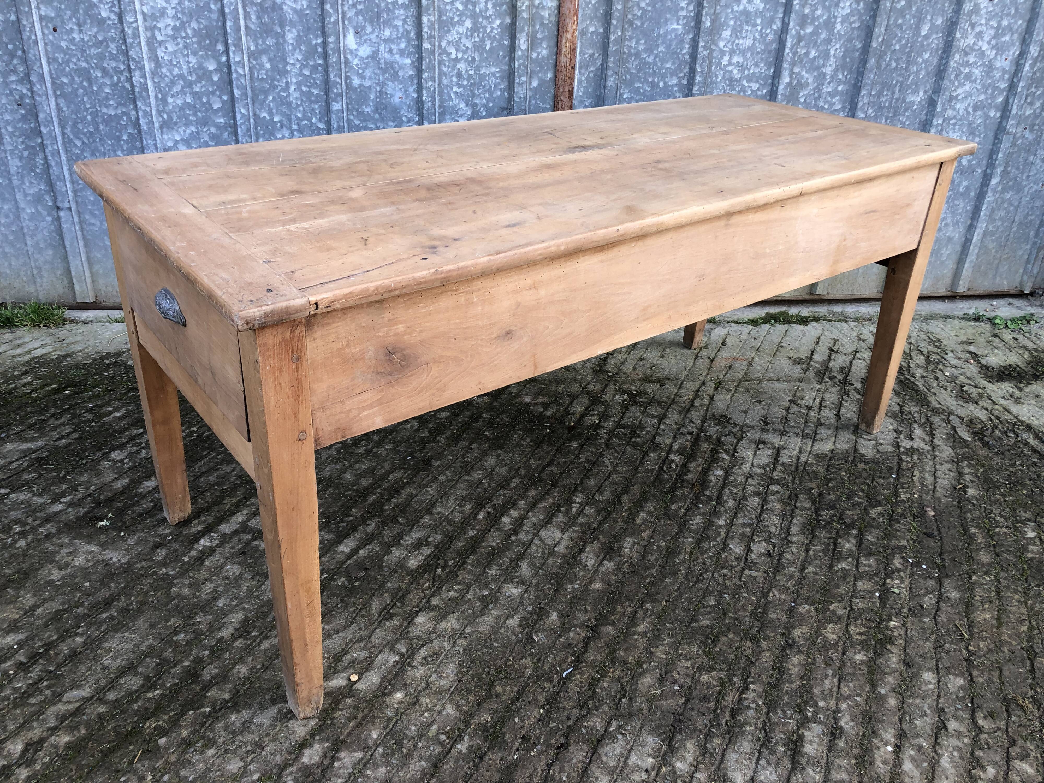 Antique solid cherry farmhouse table with 3 drawers and 1 pull out.