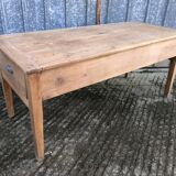 Antique solid cherry farmhouse table with 3 drawers and 1 pull out.