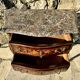 Petite commode sauteuse de style Louis XV .