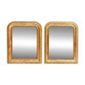 Set of two small French Louis-Philippe gilt red mirrors from the 19th century.
