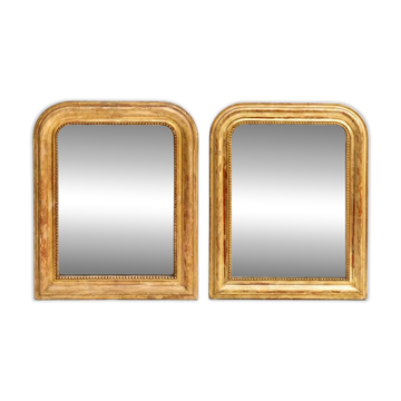 Set of two small French Louis-Philippe gilt red mirrors from the 19th century.
