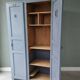Vintage grey wooden wardrobe from 1914.