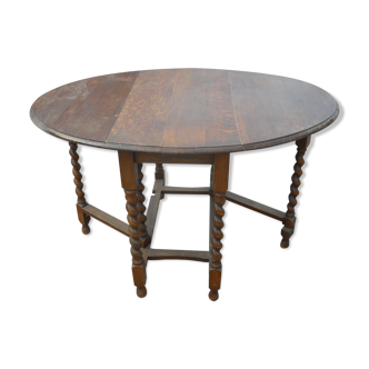 Table ovale pliante à pieds tournés